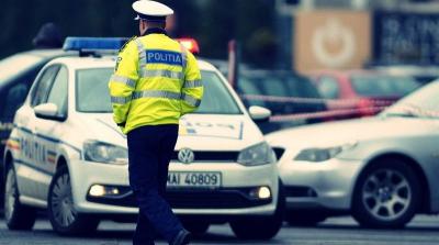 Un șofer a fost &icirc;mpușcat, după ce a vrut să intre cu mașina &icirc;n echipajele de poliție care &icirc;ncercau să &icirc;l oprească